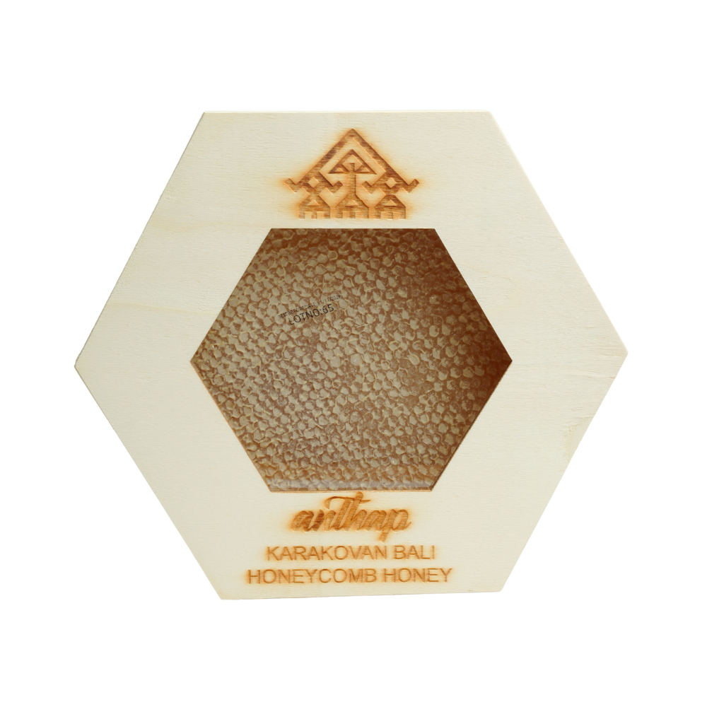 Hexagonal honeycomb honey product with 'Karakovan Bali' branding on a white background